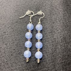 Material: Metallic Color: Small shiny pearl with blue pearl Type: Earrings Style: Casual Formal Beaded Drop Earrings, Formal Beaded Dangle Earrings, Elegant Hypoallergenic Round Bead Earrings, Elegant Blue Crystal Earrings, Blue Dangle Crystal Earrings For Formal Occasions, Blue Crystal Drop Earrings For Formal Occasions, Elegant Blue Crystal Earrings For Gift, Blue Round Beads Earrings For Jewelry Making, Light Blue Drop Earrings For Formal Occasions