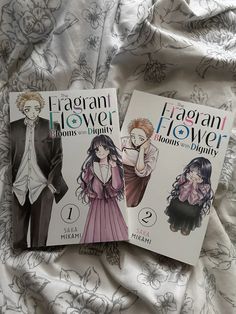 two books on the cover of hagann flower