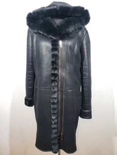 Warm stylish women's sheepskin coat with faux fur. Stylish black sheepskin coat with metal zipper and hood. The sheepskin coat is made of warm faux black fur. The outer side of the sheepskin coat is polished to protect against water. The sheepskin coat closes with a metal double-snap zipper and has a second half zipper to reduce the size. The size of the sheepskin coat will be indicated for the larger version. The coat has two pockets at the bottom. The sheepskin coat has a wonderful warm hood. the cuffs of the sheepskin coat can be rolled up to the mountain to provide decor and reduce the length of the sleeve. The sheepskin coat is light and pleasant to wear, and has a stylish look. In a sheepskin coat, you will be reliably protected from the cold and look stylish and luxurious. MEASUREME Mink Coat, Sheepskin Coat, Cool Jackets, Stylish Women, Faux Fur, Zipper, Jackets & Coats, Jackets For Women, Sleeve Length