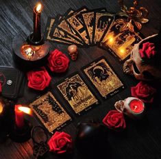 the facebook page is shown with candles, cards and roses on it's table