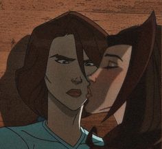 an animated image of two women kissing each other