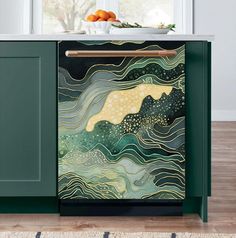 a dishwasher sitting on top of a green cabinet next to a white counter