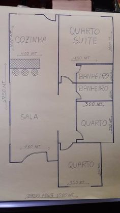 a drawing of a floor plan for a house in the middle of a desk area