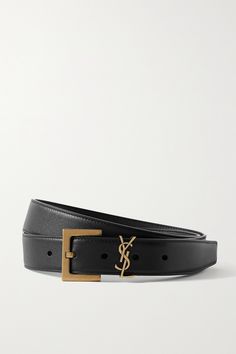 SAINT LAURENT's 'YSL' monogram was created in 1961 by the Ukrainian-French commercial poster artist Cassandre - little did he know, it would become one of the most iconic logos in fashion history. Made in Italy from supple leather, this belt is decorated with gold hardware that makes it so easy to match with any outfit or jewelry. Ysl Belt, Poster Artist, Luxury Belts, Gold Belts, Designer Belt, Branded Belts, Designer Belts, Belt Design, Saint Laurent Paris