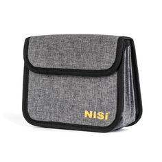 a grey and black bag with the word nisi on it's front pocket