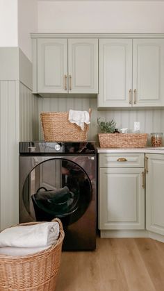 a washer and dryer in a small room