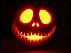 a jack o lantern pumpkin with glowing eyes