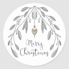 the merry christmas sticker is shown in black and white, with an ornament hanging from it's center