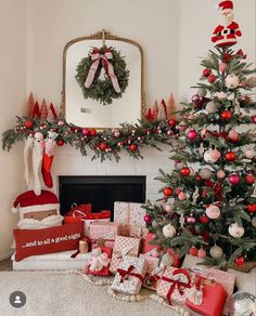 a living room decorated for christmas with presents