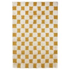 a yellow and white checkered rug on a white background with no one in it