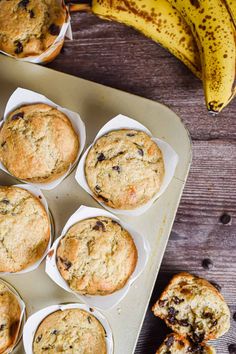 muffins and bananas on a baking tray