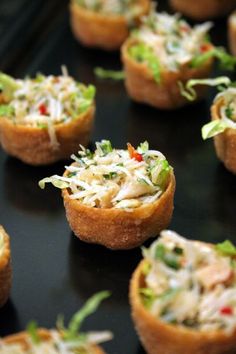 small appetizers are arranged on a baking sheet