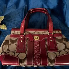 Coach Authentic Vintage Beautiful Rare Handbag In Like New Condition Inside & Out No Rips, No Tears No Scuffs No Stains Lining Looks Brand New Measurements 15 Wide By Nine Tall And 3 1/2 Inches On The Bottom Of The Purse Designer Burgundy Satchel Bag, Designer Burgundy Bag With Handles, Coach Burgundy Bag With Top Carry Handle, Classic Red Satchel With Leather Handles, Designer Coach Shoulder Bag In Burgundy, Designer Coach Burgundy Shoulder Bag, Red Handheld Satchel With Leather Handles, Designer Coach Bag In Burgundy, Designer Burgundy Coach Shoulder Bag