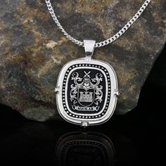 Family Crest Necklace, Personalized Family Crest Necklace, Custom Coat of Arms Necklace, Family Jewelry, Custom-made Engraved Necklace Product Details: ✅Material: 925 Sterling Silver, Gold Coating ✅Letter Design: Choose your desired letter for customization ✅Handmade with exceptional craftsmanship ✋🎨 ✅ Dimensions: 20mm  ✅ Weight: ±6gr 🛡️ Discover our custom coat of arms jewelry, a symbol of heritage made uniquely yours! 🌟💍 Choose your family crest and let us bring it to life with expert craftsmanship. 🖌️✨ Our artisans create stunning pieces in silver, gold coating, or rhodium coating, tailored to your preferences. 💫🔒 With attention to detail and a touch of elegance, our jewelry collection includes signet rings, pendants, and bracelets, each designed to showcase your personalized coa Luxury Necklace With Sterling Silver Clasp For Gift, Handmade Luxury Custom Necklace, Elegant Black Jewelry With Engraving Option, Luxury Oval Pendant Necklace For Collectors, Black Sterling Silver Jewelry With Engraving Option, Luxury Pendant Necklace For Memorials, Luxury Pendant Necklaces For Memorial, Luxury Pendant Necklace For Memorial, Luxury Polished Pendant Custom Necklace