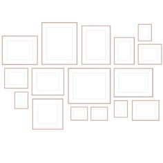 a white wall with many square and rectangle frames on it, all in different sizes