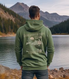 "This is the perfect hoodie for all you adventurers out there! Featuring a bold quote that serves as a reminder to take that first step, this hoodie will amp up your style while fueling your wanderlust. Crafted with high-quality fabric, this comfortable hoodie is designed for both fashion and functionality. The back showcases the inspiring quote \"Every adventure begins with a single step\", adding a touch of motivation to your wardrobe. Whether you're embarking on a grand journey or simply strolling through your daily life, this hoodie will keep you cozy and inspired along the way. Get ready to conquer new horizons with this statement-making hoodie! ✵✵ Q U I C K  F A C T S ✵✵ ✵ Fit ✵ This is a unisex heavy blend hooded sweatshirt made with a thick blend of cotton and polyester, it feels p Long Sleeve Hoodie With Drawstring For Outdoor, Hooded Sweatshirt With Kangaroo Pocket For Outdoor Activities, Hoodie Sweatshirt With Kangaroo Pocket For Outdoors, Sporty Hoodie With Kangaroo Pocket For Outdoors, Sporty Hoodie With Kangaroo Pocket For Outdoor Activities, Outdoor Crew Neck Hoodie With Kangaroo Pocket, Cotton Hoodie With Letter Print For Outdoor, Hoodie With Adjustable Hood For Outdoor Activities, Hoodie With Kangaroo Pocket For Outdoor Activities