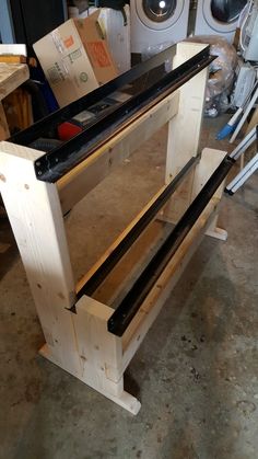 a workbench made out of wood and metal