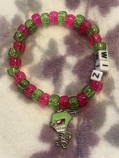 Zim from invader Zim kandi bracelet handmade by me Invader Zim Zim, Bracelets Kandi, Kandi Bracelets, Invader Zim, Bracelet Handmade, Charm Bracelets, Handmade Bracelets, Arm Band, Etsy App