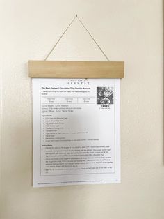 a piece of paper hanging on a wall