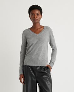 The classic cashmere v-neck sweater is timeless. Made from the finest Grade A cashmere, it's an essential that should be everyone's closet. Lightweight, soft and cozy, it's perfect for just about any time of year and occassion.  | Quince | Women's Mongolian Cashmere V-Neck Sweater in Heather Grey, Size Medium Grey V Neck Sweater, Gray Cashmere Sweater, Gray Cashmere, Basic Sweaters, Womens Cashmere, Grey Long Sleeve, V Neck Sweater, Denim Top, Striped Long Sleeve