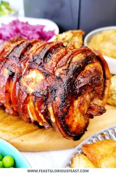 the meat is sliced up and ready to be served on the table with other foods