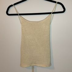 Cute Tan Knit Tank Top With Open Tie Back. Size Medium, Never Worn! Casual Knit Cami Top, Knit Cami Tops For Day Out, Knit Beige Tops For Day Out, Beige Ribbed Knit Crop Top, Beige Knitted Crop Top, Casual Cream Knit Tank Top, Beige Knit Crop Top, Beige Soft Knit Top For Summer, Knit Crop Top For Day Out