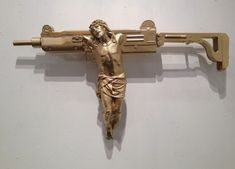 a gold crucifix hanging on the wall