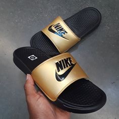 Wmns Nike Benassi Slides Just Do It Pinks Oranges Casual Gold Synthetic Slides, Gold Casual Slip-on Slides, Casual Gold Slides For Spring, Nike Benassi Slides, Nike Benassi, Nike Gold, Just Do It, Gold Black, Women's Shoes Sandals