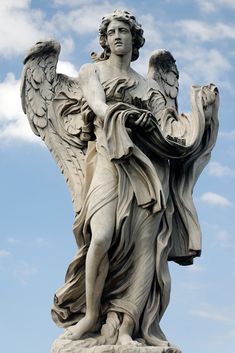 an angel statue is shown in black and white