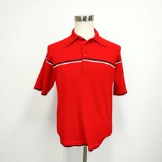 "Vintage 60s mens banlon knit shirt featuring; a pointed collar 4 buttons at the neck short sleeves has two narrow stripes across the chest, cuffs, and bottom Of a loosely woven light weight fabric that feels like Banlon...a polyester knit with lots of stretch...in a bright, vibrant red with white and navy blue stripes. Labeled \"McGregor Sportswear\" and tagged a size large, measurements when laid out flat are; 21 inches from pit to pit 7 inch sleeve 19 inches across the bottom 27 inches from nape of neck to bottom In good, preworn, vintage condition with no holes, stains, or funky odors. We are happy to ship internationally and  combine shipping...this qualifies for free domestic shipping and will ship ground." Retro Polo Collar Top With Striped Detail, Classic Red Polo Shirt With Striped Collar, Retro Polo Collar Top With Stripes, Retro Collared Top With Placket, Retro Fitted Tops With Ribbed Collar, Retro Fitted Top With Ribbed Collar, Retro Short Sleeve Polo Shirt With Striped Collar, Retro Short Sleeve Cotton Polo Sweater, Retro Red Polo Collar Top