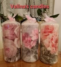 three vases with roses in them sitting on a table next to each other and the words, vellina's candles