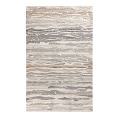 an area rug with different colors and patterns on it, including greys, beiges,