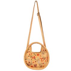 OOTD… sundresses or jeans? How we love this bag styled in every way! Wear this circle bag cute, in-hand, in the crook of your elbow or hands-free with the adjustable cross-body strap. Artisan-crafted leather knots + muti-colored floral embroidery make Aster- oh so groovy + the epitome of 1960’s cool casualness. See Meadow large and Meadow small for other options. Details 100% Full-Grain Leather Handcrafted in small batches by skilled artisans in South America and India—never mass-produced. Each Summer Leather Hobo Bag With Detachable Handle, Bohemian Top Handle Bucket Bag For Summer, Summer Hobo Satchel With Detachable Handle, Summer Hobo Bag With Detachable Handle In Satchel Shape, Summer Hobo Bag With Detachable Handle Satchel, Leather Shoulder Bag With Detachable Handle For Summer, Spring Leather Bags With Round Handle, Spring Leather Hobo Bag With Detachable Strap, Beach Leather Shoulder Bag With Bamboo Handle