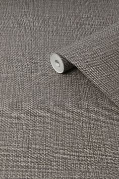 a close up view of a grey fabric textured with white pinstripe on the side