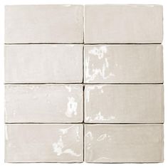 six white tiles are stacked on top of each other in the same square pattern,