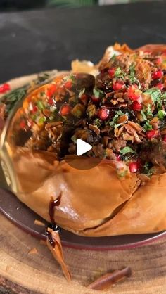 a plate filled with food on top of a wooden table