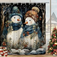 two snowmen standing next to each other in front of a christmas themed shower curtain