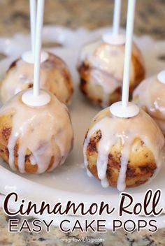 cinnamon roll cake pops on a white plate