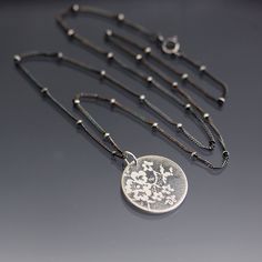 "I've etched a delicate vintage lace pattern into a hand cut sterling silver disc. I've given it a lightly oxidized, brushed finish to highlight the lace pattern. It measures approximately 3/4\" in diameter. It hangs from an 18\" sterling silver chain. The sterling silver chain is available in either an oxidized (darkened) finish or bright silver finish. The oxidized chain is pictured." Vintage Lace Pattern, West Lafayette, Silver Lace, Oxidized Sterling Silver, Lace Pattern, Vintage Lace, Sterling Silver Chain, Sterling Silver Chains