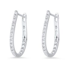 A beautiful twist on a classic, these contemporary oval-shaped hoop earrings showcase 0.50 carats of round brilliant diamonds. They measure approximately 0.75 by 0.50 inches. Modern Small Hoop Diamond Earrings, Classic Oval Diamond Earrings With Pave Setting, Teardrop Diamond Hoop Earrings With Accents, Oval Brilliant Cut Hoop Earrings For Formal Events, Oval Hoop Earrings With Brilliant Cut For Formal Occasions, Elegant Oval White Gold Huggie Earrings, Oval Huggie Earrings For Formal Occasions, Diamond White Oval Hoop Earrings For Formal Occasions, Formal Oval Hoop Earrings With Prong Setting