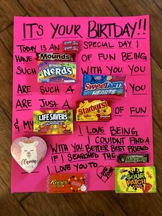 a pink sign with candy on it that says it's your birthday