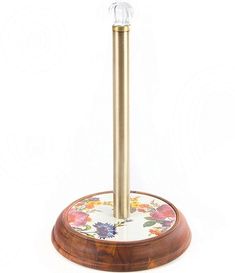 a gold colored metal pole with flowers on it and a glass ball in the center