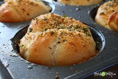 freshly baked bread in a muffin tin