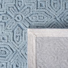 The sophisticated rugs in the Textural Collection display finely textured patterns, etched into a rich, solid colored, looped pile. Textural rugs are hand-tufted using pure wool with a cotton backing adding depth and dimension in any room and a cushioned, comfort-soft feel underfoot. Safavieh Textural Audeline 2 X 8 (ft) Wool Blue Indoor Geometric Bohemian/Eclectic Runner Rug | TXT101M-28 Eclectic Area Rug, Coastal Rugs, Light Blue Rug, Collection Display, 9x12 Rug, Striped Rug, Hand Tufted Rugs, Rug Sale, Displaying Collections