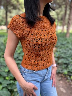 🍊✨ Crochet Charm! ✨🍊 👚 Product Name:Orange Crochet Short-Sleeve Crop Top ✨ Features: - Handcrafted crochet design 🧶 - Vibrant orange color 🍊 - Comfortable short sleeves 🌬️ Fitted Bohemian Crochet Crew Neck Top, Fitted Crochet Tops For Fall, Fitted Cotton Crochet Top For Fall, Fall Fitted Crochet Top With Short Sleeves, Fitted Crochet Top With Short Sleeves For Fall, Fitted Knitted Orange Top, Fitted Crochet Lace Top With Crew Neck, Fitted Short Sleeve Crochet Top For Fall, Fitted Orange Knitted Tops