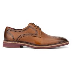 Show off your dapper look with the Smith oxford shoes. This season, be inspired by the shoe's stylish brogue accents and classic lace-up design. The delicate stitching adds a touch of sophistication, while the comfy sole ensures all-day wearability. Perfect for both formal occasions and smart-casual settings, the Smith oxford combines elegance with comfort. Elevate your wardrobe and make a statement with these refined shoes that offer both timeless style and modern comfort. Masculine Brogue Oxfords Lace-up, Masculine Lace-up Oxfords With Brogue Detailing, Masculine Lace-up Dress Shoes With Brogue Detailing, Wingtip Oxford Shoes With Stitched Sole, Formal Brogue Lace-up Shoes With Plain Toe, Masculine Brogue Dress Shoes For Business Casual, Masculine Business Casual Dress Shoes With Brogue Detailing, Wingtip Oxford Dress Shoes With Stitched Sole, Leather Oxfords For Derby