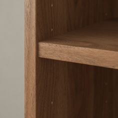 a close up view of a wooden shelf