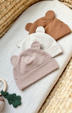 The cutest baby bear hat made from soft COTTON jersey fabric. Perfect for photoshoots or everyday wear, sweet gift for new parents. Available in various sizes for a perfect fit. Add a touch of whimsy to your baby's wardrobe today! This charming baby hat is made to keep your baby snug and cozy while adding a touch of cuteness to their outfit. It has adjustable turn up band, where you can add baby`s name EMBROIDERY to create your custom baby hat.  We use EMBROIDERY for name personalization as this Newborn Baby Caps, Personalized Baby Hat, Infant Hat, Newborn Beanie, Newborn Hats, Name Embroidery, Unique Baby Shower Gifts, Girl Name, Baby Bonnets