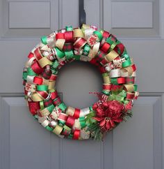 a christmas wreath is hanging on the front door