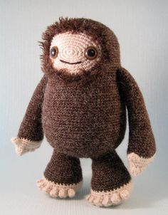 a crocheted stuffed animal with big eyes